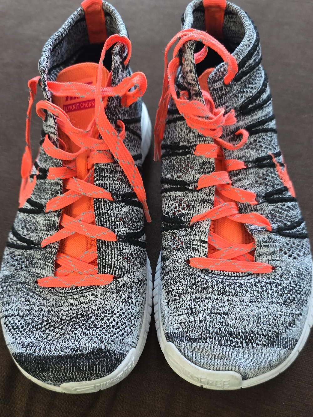 Nike Flyknit Chukka Sneakers in Black, White & Orange
